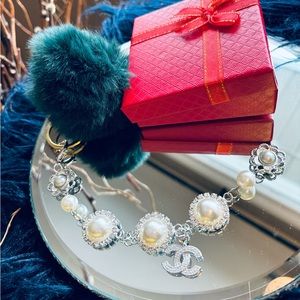 Luxury charm in handmade chain for bag charm with pom